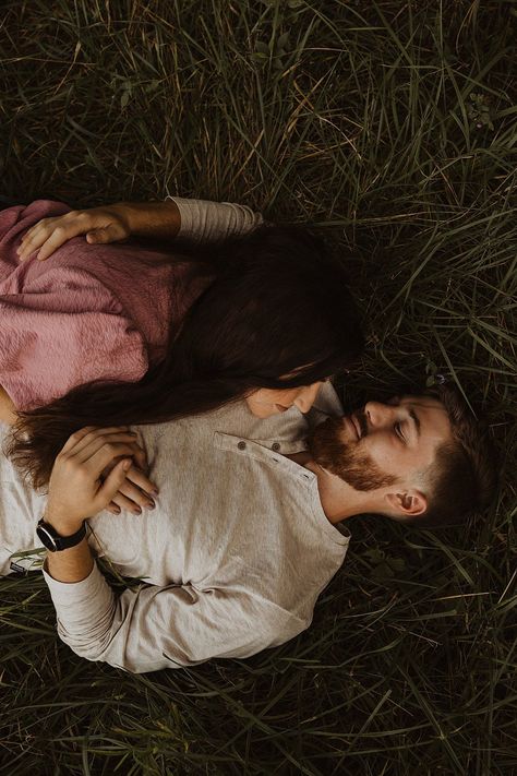 Laying In The Grass Aesthetic Couple, Couple Laying In Field, Laying In Grass Aesthetic, Green Couple Aesthetic, Couples Laying Down Pose, Laying On Chest Couple, Couple Laying Together, Grass Plains, Alternative Engagement Photos