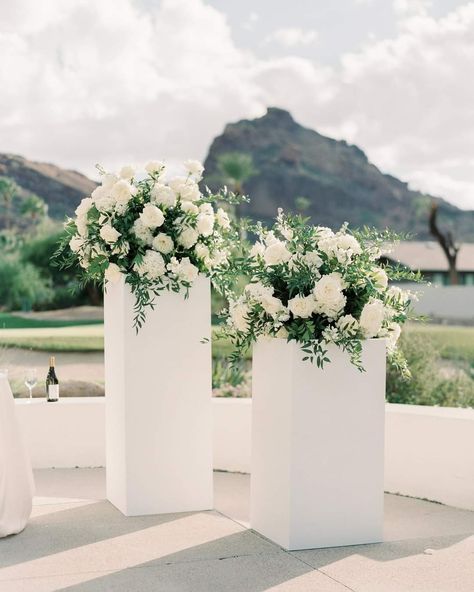 Floral Statement Pieces Wedding, Planters Wedding Ceremony, Aisle Entry Arrangements, Wedding Backdrop Alter, Ceremony Flowers On Pedestals, White Pedestal Wedding, White Cross Wedding Alter, Wedding Podium Flowers, Wedding Pedestals Ceremony