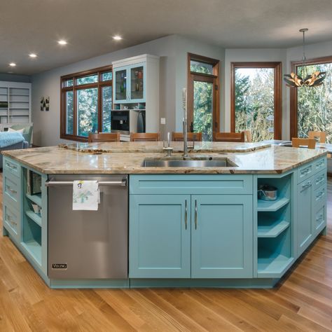 In an open floor plan, a rectangular kitchen island isn't always the best fit. This diamond shaped island-- aptly painted tiffany blue-- is a perfect fit for the space and provides ample counter space and storage options. U Shaped Kitchen Island, Kitchen Island With Sink And Dishwasher, Corner Kitchen Layout, Fairy Core Bedroom, Granite Top Kitchen, Kitchen Island Shapes, Kitchen Island With Granite Top, Kitchen Layouts With Island, Kitchen Island With Sink