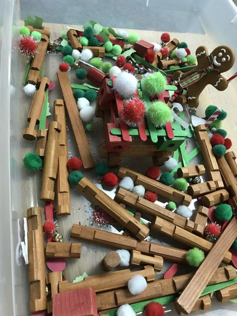 This sensory tub is perfect for preschool or young special needs children. It was created to accompany the story “The Gingerbread Baby” by Jan Brett. Add some holiday or winter colored popsicle sticks, Pom poms, blocks, sprinkles or colored rice, some foam “candies,” and some Lincoln logs to create a house for the gingerbread baby like Matti did in the story! Kindergarten Gingerbread House, Christmas Sensory Table Preschool, Gingerbread Block Center Preschool, Block Ideas For Preschool, Gingerbread Sensory Bin Preschool, Gingerbread House Sensory Bin, Gingerbread Centers Preschool, Gingerbread Block Center, Christmas Sensory Bin Kindergarten