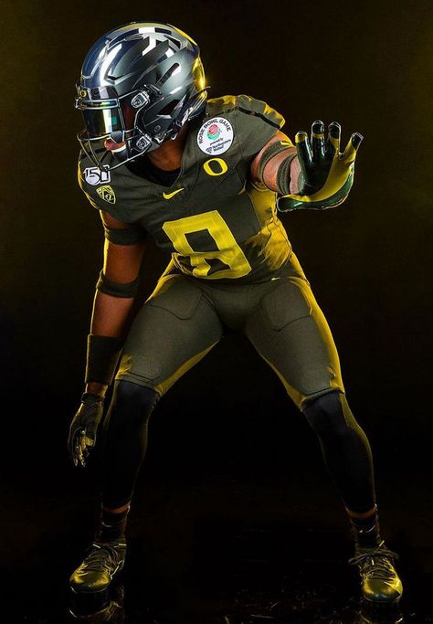 Oregon Ducks to wear nightmare green uniforms, chrome helmets with green wings in Rose Bowl - oregonlive.com Oregon Ducks Uniforms, Green Wings, Oregon Football, Ducks Football, Duck Wallpaper, Green Wing, Live Channels, Oregon Ducks Football, Football Uniforms