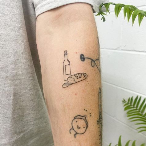 Bottle of wine w/ a side of bread 🤌🍷🥖 @mr_ritchie . . . #handpoke #stickandpoke #machinefree #tattoo #stickandpoketattoo #handpoked… | Instagram Tin Can Tattoo, Daily Bread Tattoo, Food Related Tattoos, Bread Tattoo Ideas, Bread And Wine Tattoo, Loaf Of Bread Tattoo, Charcuterie Tattoo, Sardine Can Tattoo, Grape Tattoo Minimalist