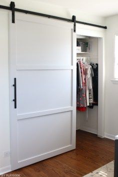 How to add functional and stylish storage to an office. Love these tips for secret storage so you can keep your office organized and clutter hidden! Hanging Barn Doors, Barn Style Sliding Doors, Barn Door Closet, Modern Barn Door, Diy Barn Door, غرفة ملابس, Hus Inspiration, Modern Barn, In The Closet