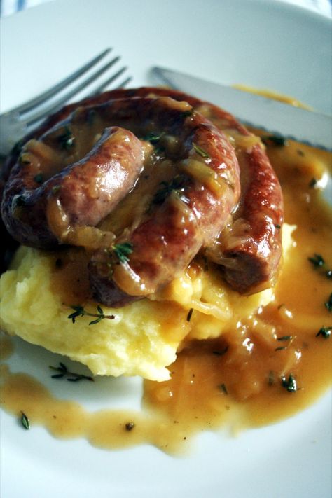 Bangers, Mash and Onion Gravy Bangers And Mash Guiness Gravy, Mustard Gravy Recipe, Roux Sauce, Bangers And Mash, Potato Ricer, Homemade Gravy, Onion Gravy, Cooked Carrots, Comfort Food Recipes Dinners