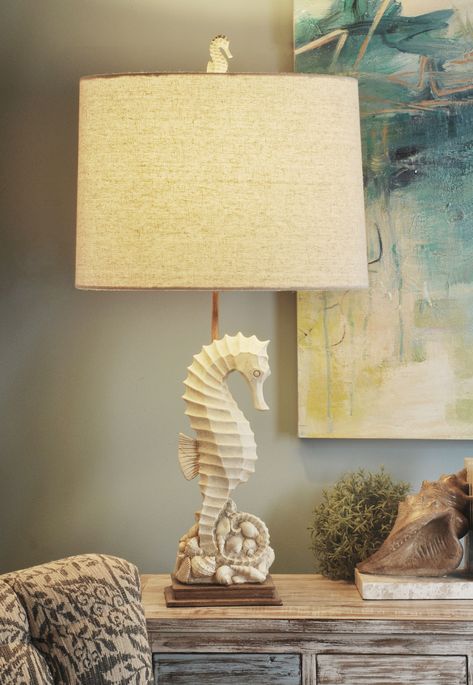 Complete your coastal oasis with this poly table lamp. The seahorse design is perfect if you want to add some fun to your abode, while the beige and ivory finish bring a sense of calm to the design. Catch the attention of your guests by placing this lamp in your entryway or guest room. StyleCraft Home Collection 31-in Beige with Ivory 3-Way Table Lamp with Fabric Shade | L34160BDS Nautical Table, Coastal Living Rooms, Table Lamp Sets, Light Bulb Types, Beautiful Lamp, Lamp Sets, Coastal Style, Drum Shade, Beach House Decor