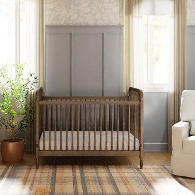 Liberty's fresh take on the antique spindle crib brings vintage elegance to the nursery. The classic silhouette is made bolder with a sturdy frame and thicker spindles. The versatile Liberty crib is the perfect centerpiece in any nursery. | Namesake Liberty 3-in-1 Convertible Spindle Crib Brown, Wood | MDBC1034_97018843 | Wayfair Canada Spindle Crib, White Baby Cribs, Brown Crib, 135 Pounds, Girly Nursery, Wood Crib, Spindle Design, Crib Toddler Bed, Baby Boy Room Decor