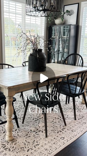 Sherri Middleton on Instagram: "🖤SALE ALERT!! Love my new side chairs and the lighter feeling my dining room now has.  🖤Comment SHOP for links sent to your DM. Make sure you are following me or IG will block the link.  These new side chairs are exactly what I was looking for. I love the curved back and spindles. They’re super comfortable and complement the Windsor chairs I already had. My dining room looks and feels bigger and airier.   You can also shop by taking a screen shot of this link⬇️ saving to photos and then tapping on the link. https://liketk.it/4FaYl  All items are in my LTK shop.  Side chairs Windsor chairs Dining room Dining table Dining room rug Modern organic vintage Chic living Neutral home Neutral decor Neutral furniture  Affordable home decor Spring decor Home trends C Light Wood Dining Table With Black Chairs, Dining Room Rug Modern, Transitional Dining Room Inspiration, Modern Boho Dining Room, Home Neutral, Christmas Dining Table Decor, Modern Farmhouse Living Room Decor, Modern Farmhouse Dining Room, Home Decor Spring