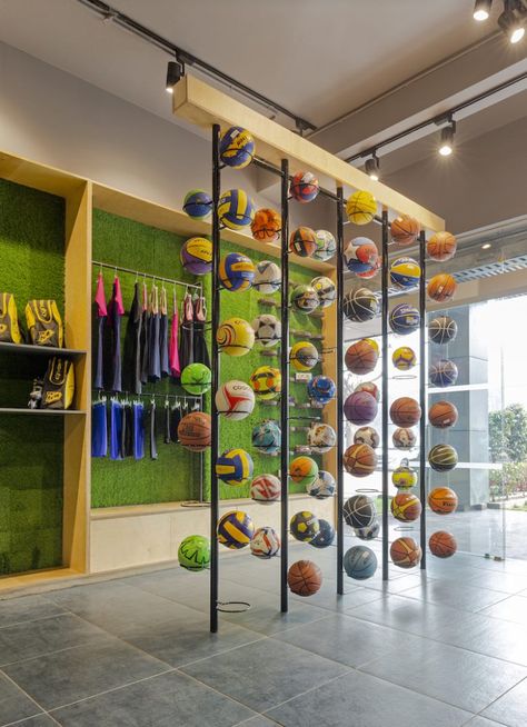 Sports Store Interior Design, Small Sports Shop Interior Design, Sports Store Display, Athletic Store Design, Sports Showroom Interiors, Sports Office Design, Sport Retail Store Design, Sporting Goods Store Design, Sports Store Interior