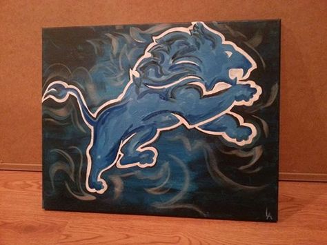 Detroit Lions Painting by sportsONcanvas on Etsy Detroit Lions Painting, Lions Painting, Lions Wallpaper, Detroit Lions Wallpaper, Football Paintings, Lion Canvas Painting, Bedroom Upstairs, Sports Bedroom, Chalk Design