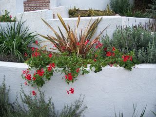 Steep Hillside Landscaping, Landscape Timbers, Industrial Garden, Cascading Flowers, Building A Pergola, Hillside Landscaping, Stucco Walls, Front Landscaping, Wall Seating