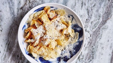 Cacio e Pepe Chips Recipe | Bon Appetit Finger Foods Appetizers, Mozzarella Sticks Recipe, Spiced Popcorn, Potato Chip Recipes, Christmas Appetizer, Movie Night Snacks, Spiced Pecans, Thanksgiving Appetizers, Chips Recipe