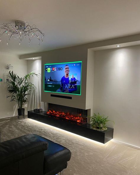 Yep... we just got a new favourite media wall🔥 What a pleasure it’s been creating this feature wall with the stunning @evonicfires with… Feature Walls In Living Room, Modern Tv Wall Units With Fireplace, Modern Media Wall With Fireplace And Tv, Living Room Media Wall With Fire, Simple Media Wall, Bedroom Media Wall, Media Wall With Tv Fire And Storage, Small Media Wall Ideas, Fire Place Media Wall