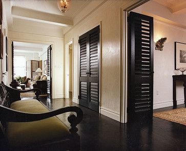 louvre doors Caribbean Bedroom, West Indies Decor, British Colonial Decor, Black Interior Doors, Black Shutters, Colonial Interior, Colonial Design, British Colonial Style, Casas Coloniales