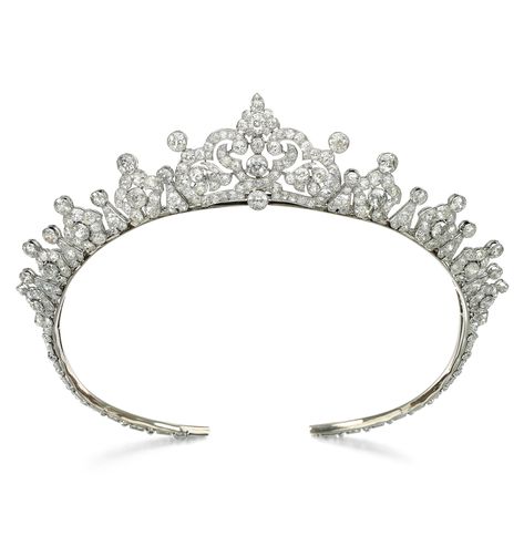 Cartier | A fine Art Deco diamond necklace/tiara, 1930s. The central, detachable, openwork panel, between a graduated series of palmette and arrow-head motifs, set throughout with circular-cut and cushion-shaped diamonds, length approximately 430mm, signed Cartier, accompanied by a tiara fitting, screwdriver and brooch fitting, inner circumference of tiara approximately 450mm (expandable), central element may be worn as a brooch. Cartier Tiara, Tiara Necklace, Cartier Diamond, Wallis Simpson, Cartier Necklace, Diamond Tiara, International Jewelry, Necklace Clasps, Harry Winston