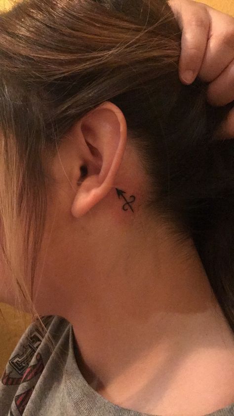 Sagittarius Arrow behind ear tattoo || April Rivera Tattoo Placement Hip, Sagittarius Arrow, Sagittarius Tattoo Designs, Small Symbol Tattoos, Small Tattoo Placement, Quote Tattoos Girls, Sagittarius Tattoo, Small Tattoos With Meaning, Constellation Tattoo