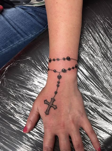 225+ Cute Rosary Tattoos Ideas and Designs (2023) - TattoosBoyGirl Rosary Tattoo For Women Arm, Rosery Tattoos On Hand, Tattoo Designs On Shoulder, Rosary Tattoo Wrist, Rosary Tattoo Design, Roseary Tattoo, Shock Tattoo, Rosary Tattoo On Hand, Tato Lengan Bawah