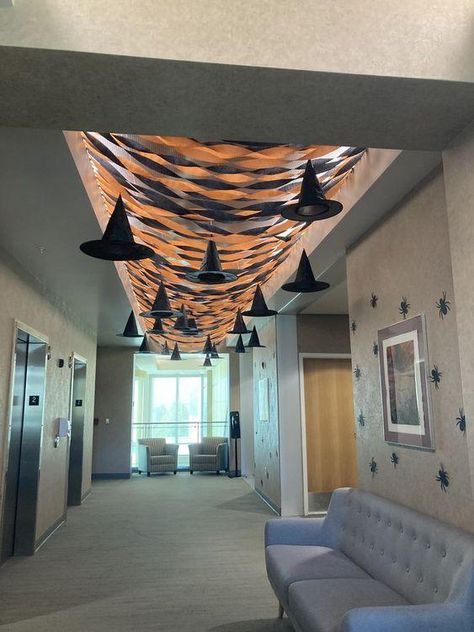 Breakroom Halloween Decor, Halloween Break Room Ideas, Halloween Breakroom Decorations, Streamer Halloween Decorations, Halloween Lobby Decorations, Work Halloween Decorating Contest, Fall Contest Ideas For Work, Halloween Streamer Ideas, How To Decorate With Streamers