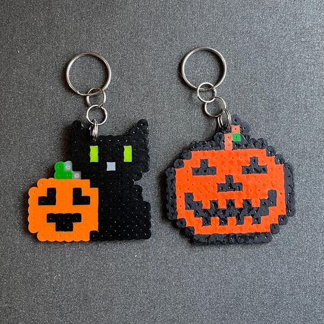 Set of 2 keychains (melting beads) -black cat w/ pumpkin/jack o lantern -bigger pumpkin/jack o lantern Small Halloween Perler Beads, Matching Perler Bead Keychains, Halloween Keychains Diy, Aesthetician Wallpaper, Cute Small Pixel Art, Small Pixel Art Ideas, Small Perler Bead Patterns, Perler Beads Keychain, Halloween Trinkets