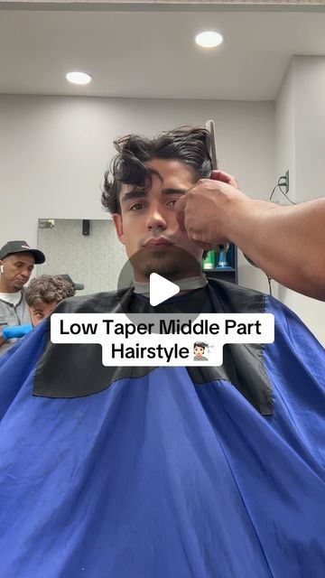 Marcos Philip on Instagram: "Low taper middle part hairstyle 💇🏻 
.
.
Yall rock with the cut? 🤔
.
#marcosphilip #hairstylevideo #hairstyleideas #hairstylemen #hairstyleoftheday" Mens Hairstyles Middle Part Fade, Low Taper Messy Middle Part, Middle Part Hairstyles Short Hair, Middle Part With Taper, Low Taper Fade Haircut Wavy Hair, Middle Fade Haircut Men, Short Middle Part Men, Middle Part Hairstyles Men Wavy, Low Taper Fade Middle Part