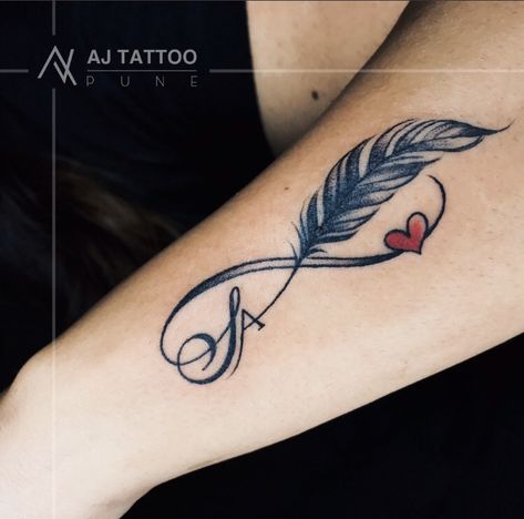 Infinity Tattoos Done By @ajtattoopune Follow @ajtattoopune for more ! - "WALK in for FREE Consultation" To Book an Appointment DM or Call 📞 7709537129 / 9665954007 @ajtattoopune • Fastest Growing Tattoo Studio in Pune • Trusted by 7000+ Clients • Walk in for Free Consultation! Contact Us for Any Queries! #infinity #infinitytattoo #infinitytattoos #infinitytattoodesigns #infinitysymbol #tattooforgirls #besttattooartistinpune #ajtattoo #ajtattoostudio #ajtattoopune #punetattoo #dang Feather Tattoo With Infinity, Feather And Infinity Tattoo, Infinity Feather Tattoo Design For Women, Infinity Feather Tattoos, Infinite Tattoos For Women, Feather Infinity Tattoo Design, Infinity Feather Tattoo Design, Infinity Tattoos For Women, Infinity Feather Tattoo