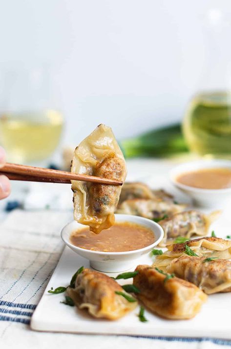 It's easy to make dumplings (potstickers) at home! Thai Chicken Dumplings (with peanut dipping sauce) have big flavor and are fun to make! #thaidumplings #thaidumplingrecipe #potsticker #peanutdippingsauce Biscuits Dumplings, Dumplings Recipe Chicken, Crockpot Biscuits, Dumplings Crockpot, Thai Dumplings, Chicken And Dumplings Soup, Veggie Potstickers, Dumplings With Biscuits, Chicken And Dumplings With Biscuits