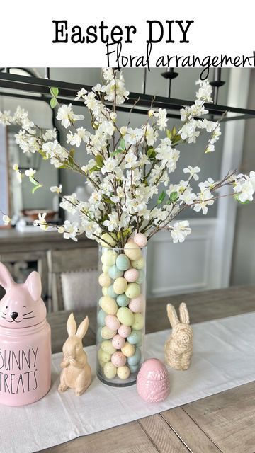 Courtney Hamilton on Instagram: "Here’s a DIY Easter floral arrangement idea. I mixed floral stems from @target & michaels and added pastel eggs to create this look. I didn’t have a small enough vase to fit down into the larger one with the eggs so I used a glass cup instead to support the stems. I plan to use this as a table centerpiece for Easter. #easterdecor #easter #easterdiy #centerpiece #floralarrangement #easterfloral #decoridea #eastercenterpiece #diydecor #homedecorating #tablesca Easter Egg Centerpiece, Easter Vases Ideas, Easter Vase Ideas, Easter Vase, Easter Vase Filler Ideas, Spring Vase Filler Ideas, Vase Filler Ideas, Easter Table Centerpieces, Spring Vases