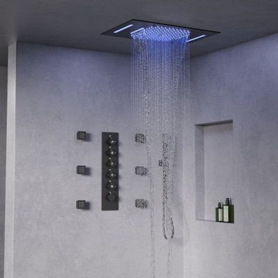 The 'GRANDJOY' Shower System is a versatile and luxurious design with a dual shower head and a handheld spray. Its multifunctional pattern not only enhances the bathing experience but also caters to various household scenarios, making it suitable for everyone in the family, including couples, children, and pets. This high-quality system is cUPC certified, ensuring resistance to corrosion and durability, and comes with a lifetime warranty for added peace of mind. Additionally, its user-friendly i Ceiling Mounted Shower Head, Led Colors, A Daily Routine, Waterfall Shower, Colored Led Lights, Dual Shower Heads, Fixed Shower Head, Luxury Shower, Handheld Shower Head