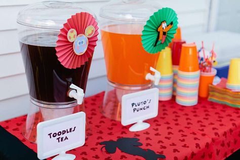 Aidan's Mickey Mouse Clubhouse First Birthday  | CatchMyParty.com Mickey Mouse Drink Ideas, Mickey Mouse Drinks, Mickey Birthday Food Ideas, Mickey Carnival Birthday Party, Diy Mickey Mouse Birthday Party Decorations, Disney Theme Party Food, Mickey Birthday Food, Mickey Mouse Clubhouse Birthday Party Food, Mickey Mouse Summer Birthday Party