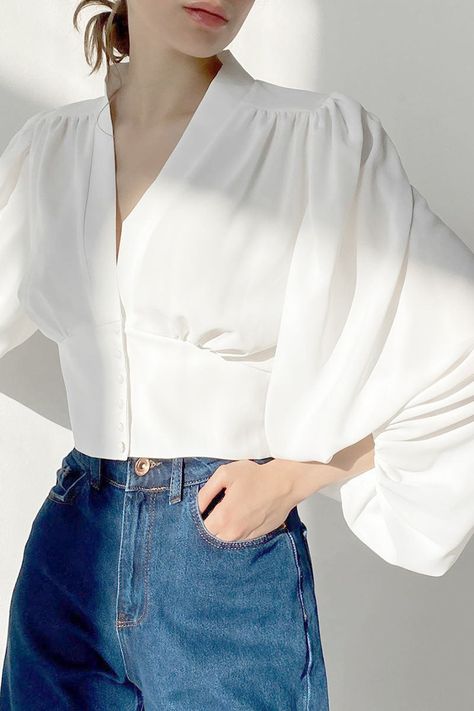 Details: Material: Polyester Style: Fashion, Street Pattern Type: Solid Element: Split Joint Neckline: V Neck Sleeve Style: Lantern Sleeve Sleeve Length: Long Sleeve Clothing Length: Short Size(in) Length Shoulder Width Bust Sleeve Length S 16.1 13 33.1 18.5 M 16.5 13.4 34.6 18.9 L 16.9 13.8 36.2 19.3 Tips: Due to the many variations in monitors, the color in the image could look slightly different, please take physical design and color shall prevail. Please allow 0.4"-1" differs due to manual m Wine Red Blouse, Blouse Corset, Woman Blouse Casual, Cardigan Rosa, Corset Blouse, Lantern Sleeve Top, White Shirts Women, Collars For Women, Puff Sleeve Blouse