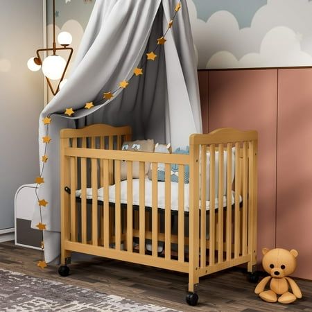 Looking for small cribs for small spaces? Our mini crib is what you need. This baby bed offers the perfect blend of style, safety, and craftsmanship in a scaled-down size. Whether you have a smaller nursery or in need of a spare travel crib for visits to grandma and grandpa's house, this mini crib serves as a versatile and compact sleep solution for your little one. With the same design and safety features as its full-size counterparts, our baby cribs are expertly crafted for ease of assembly. T Mini Crib Nursery Small Spaces, Cribs For Small Spaces, Foldable Crib, Portable Baby Cribs, Mini Crib Nursery, Small Crib, Small Space Nursery, Baby Cribs Convertible, Small Nurseries