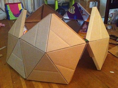 Cardboard Houses For Kids, Cardboard Forts, Cardboard Play, Cardboard Fireplace, Cardboard Crafts Kids, Cardboard Playhouse, Silver Spray Paint, Cardboard Toys, Cardboard House