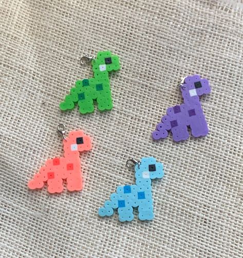 BEAD BUDDY PATTERNS #BeadPatterns Beads Iron Pattern, Cute Peler Beads Ideas, Perler Beads Bracelet, Dinosaur Perler Bead Pattern Small, Cute Hama Bead Ideas Small, Sully Perler Beads, Peer Bead Ideas, Fuse Bead Keychains, Dino Perler Bead Pattern