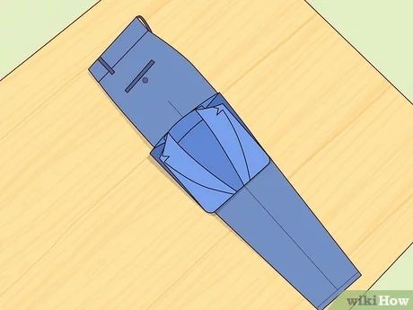 How to Pack a Suit Into a Suitcase: 5 Simple Methods How To Fold Pants, Simple Suits, Fashion Organization, Business Trip, Prevent Wrinkles, Men’s Suits, Packing Tips For Travel, Business Suit, Packing Tips