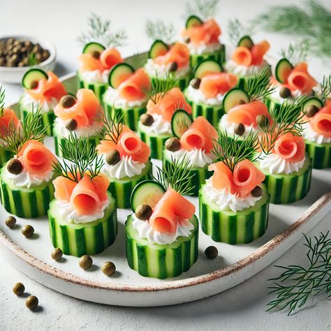 Cucumber Salmon Bites are a light and refreshing appetizer, perfect for entertaining or a healthy snack. These bite-sized treats feature crisp cucumber slices topped with smoked salmon, cream cheese, and fresh herbs like dill. The combination of the cool, crunchy cucumber and the rich, savory salmon makes for a delicious and elegant dish that's easy to prepare and full of flavor. Ideal for parties or a quick snack, these bites are both nutritious and satisfying. Smoked Salmon On Cucumber Slices, Smoked Salmon Cucumber Bites, Cucumber Salmon Bites, Salmon Cucumber Bites, Cucumber Salmon, Tuna Bites, Smoked Salmon Cucumber, Savory Salmon, Salmon Cucumber