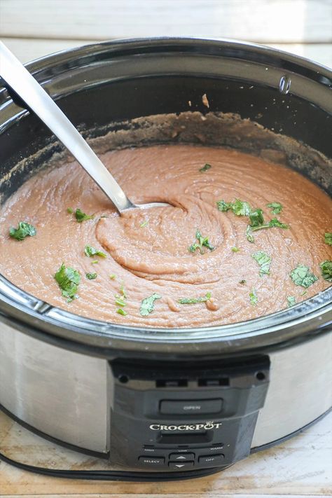 Mexican Style Crock Pot Refried Beans · Easy Family Recipes Crock Pot Refried Beans, Crockpot Refried Beans, Mexican Refried Beans, Beans Recipe Crockpot, Beans In Crockpot, Homemade Refried Beans, Refried Beans Recipe, Fried Beans, Easy Family Recipes