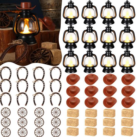 PRICES MAY VARY. Complete Western Themed Party Decorations Set: this collection consists of 120 combined sets of western cowboy theme party decorations; The package offers 24 mini lanterns, 24 mini cowboy hats, 24 mini horseshoes, 24 wagon wheels and 24 hay bales; This inclusive package will meet all your decorative needs, allowing for extra items to be stored for future use Delicate Western Cowboy Theme: our western theme centerpieces are suitable for those with a love for the west and cowboy c Cowboy Party Centerpiece Western Theme, Rustic Western Party Decor, Western Themed Decor, Centerpiece For 50th Birthday Party, Fall Western Wedding Table Decor, Rodeo Table Decorations, Rodeo Theme Party Decor, Cowgirl Baby Shower Centerpieces, Western Gender Reveal Decorations