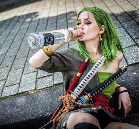 Female Zoro, Zoro Cosplay, Roronoa Zoro One Piece, Pastel Blue Background, One Piece Cosplay, Harley Quinn Cosplay, Zoro One Piece, Most Popular Memes, Human Poses