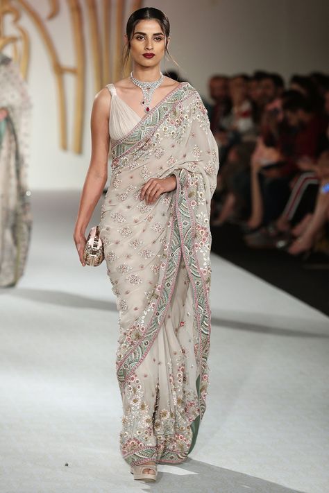 Varun Bahl Saree:  Georgette silk floral embroidered saree with blouse & petticoat, in muted color shades. #varunbahl #saree #sari #sarees #saris #necklace #indianfashion #desifashion @ #azafashions via @sunjayjk