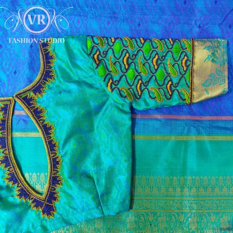 Green embroidery blouse with tube beads, sugar beads and zari threads Blue Blouse Designs, Work Blouse Designs, Blouse Designs Catalogue, Maggam Work Blouse, Latest Blouse Designs Pattern, Wedding Saree Blouse Designs, Cutwork Blouse Designs, Blouse Design Images, Wedding Blouse Designs