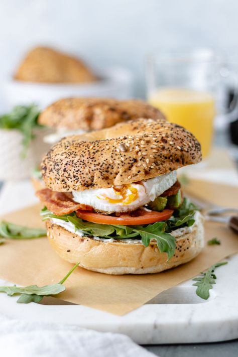 Who doesn't love breakfast? Especially when it's a legit bagel sandwich. You gotta check out this amazing BLT Fried Egg Bagelwich. Thick cut applewood smoked bacon, peppery arugula, a slice of tomato, creamy avocado, and a schmear of herby cream cheese on an everything bagel and topped with a perfectly cooked fried egg. This bagel sandwich makes for the most delicious breakfast or lunch to enjoy any day of the week. | #breakfast #brunch #eggs #eggrecipes #bagel #bacon alifedelic via @alifedelish Easy Brunch Recipes, Bagel Sandwich, Recipe Cover, Best Italian Recipes, Easy Brunch, Smoked Bacon, Everything Bagel, Food For A Crowd, Delicious Breakfast