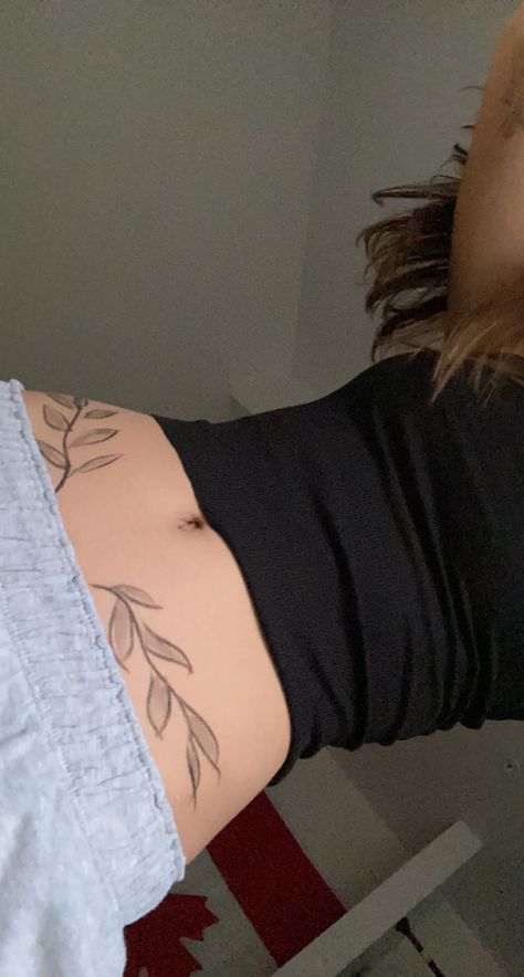 Around The Waist Tattoos For Women, Vines On Stomach Tattoo, Fern Tattoo On Stomach, Waist Tattoos Flower, Lower Side Tattoo, Botanical Tramp Stamp, Hip Tattoos Women Vines, Leaves On Stomach Tattoo, Leaf Stomach Tattoo