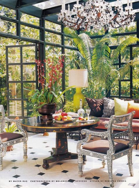 A conservatory in a 1920′s Beverly Hills residence decorated by Thomas Beaton merges traditional and orientalist design. Photography by Melanie Acevedo for House & Garden. 1920s Interior, 1920s Interior Design, Sunroom Decorating, 1920s House, Stained Table, Beverly Hills Houses, Glass Room, Glass House, Winter Garden