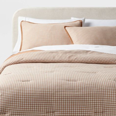 Add vintage vibes to your bedscape with this Mini Gingham Comforter and Sham Set from Threshold™. Made of 100% cotton, this bedding set features a soft-filled comforter adorned with mini gingham checks and a coordinating solid-color reverse, adding depth and dimension to your bedroom sanctuary. Completing the set are two matching pillow shams with a convenient six-inch envelope closure for secure pillow insert placement and easy removal. Threshold™: Looks like home, feels like you. Brown Gingham Bedding, Vintage Master Bedrooms Decor, Mismatched Bedding, Gingham Comforter, Charleston Bedroom, Best Comforters, Down Comforter Bedding, Bunker House, Master Bedrooms Decor Cozy