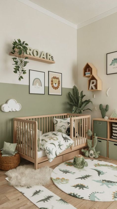 Dinosaur-themed baby boy nursery with green accents, playful decor, and natural wood furniture. Green Animal Themed Nursery, Simple Nursery Paint Ideas, Nursery Ideas Painting, Irish Nursery Theme, Sage Green And Gray Nursery, Boys Room Dinosaur Theme, Dino Nursery Ideas, Nursery With Green Accents, Jurassic Park Nursery