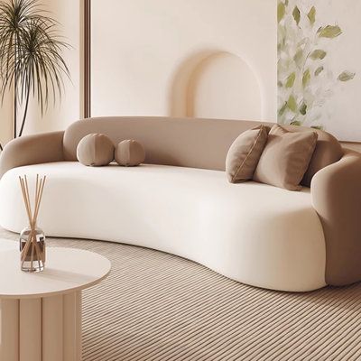 Featuring a minimalist design, this sofa showcases a durable white matte finish with a refined, non-pilling suede texture. The subtle elegance of its surface ensures long-lasting style and easy maintenance. Danbenla design | Danbenla design Beauty salon lounge detachable curved sofa. brown in Brown;white | 27.55" H X 70.86" W X 41.33" D | Wayfair Cloud Couch Living Room, Hangout Area, Curve Sofa, Japandi Living Room, Brown Flannel, Suede Texture, Japandi Living, Lounge Space, Sofa Brown