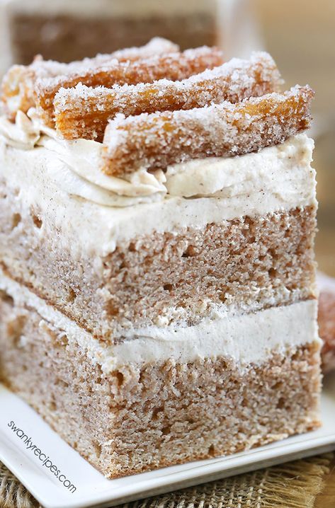 Churro Cake - Moist Mexican cinnamon butter cake with cream cheese buttercream frosting and churros. This decadent layer cake takes dessert to the next level! Churro Cake, Cream Cheese Buttercream Frosting, Mexican Cake, Cream Cheese Frosting Cake, Cinnamon Cream Cheese, Cream Cheese Buttercream, Mexican Dessert Recipes, Brownie Desserts, Cake With Cream Cheese Frosting