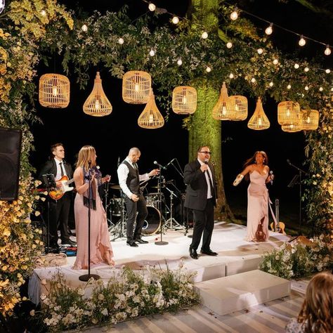 Kaytee Stice | Wedding Florist on Instagram: "There’s nothing quite like dancing under starlight. When the band starts the sounds of revelry begin! Planning + Design: @annaluciaevents Lighting: @jmeventgroup Dance Floor Wrap: @paradisegraphix Photo: @hunterryanphoto Entertainment: @aragonartists Floral Design: @rootsfloraldesign" Wedding Ideas Dance Floor, Big Band Wedding, Wedding Dance Floor Decorations, Wedding Dance Floor Design, Photo Stand Wedding, Wedding Live Music, Starlight Wedding, Dance Floor Wrap, Band Stage