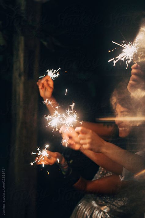 New Year's Eve by Lumina for Stocksy United New Year Eve Picture Ideas, New Years Photography, New Years Eve Pictures, Sparkler Photography, Sparkling Candle, New Year Diy, New Year Pictures, Party Photography, Outdoor Photoshoot