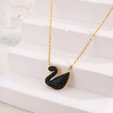 Elegant Black Swan Pendant Necklace - A Symbol of Grace and Beauty 🖤✨ Embrace the elegance of this stunning black swan pendant necklace, crafted to symbolize grace, beauty, and transformation. The delicate gold chain perfectly complements the bold black swan adorned with sparkling crystals, making it the ideal accessory for any occasion. Whether you're dressing up for a night out or adding a touch of sophistication to your everyday look, this piece will surely captivate attention. Shop now a... Swan Jewelry, Swan Pendant, Set Video, Delicate Gold Chain, Grace Beauty, Birthday Items, Chains Necklaces, Necklace Black, Black Swan