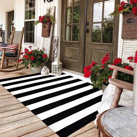 PRICES MAY VARY. 🌟CUSTOMIZED SIZE：Our oversized rug 35.4'' x 59''is larger than commonly available 27.5” x 43”rugs，put it on your front porch with a WELCOME door mat Or HELLO door mat on top. Very cute layering! the latest and most trendy farmhouse decor! 🌟HIGH QUALITY OUTDOOR RUG: A considerate care for you and your families with high-quality cotton threads and environment-friendly fabrics, which are well-made long-lasting use, soft and comfortable.Available on both sides. 🌟 VARIOUS OCCASION Black And White Striped Rug, Layered Door Mats, Farmhouse Rugs Living Room, Outdoor Entryway Decor, Outdoor Entryway, Front Door Mat, Porch Rug, Front Door Rug, Rug Outdoor